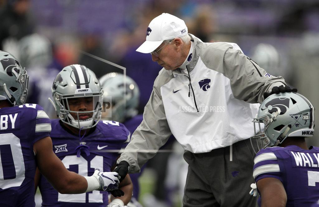 Orlin Wagner Kansas State head coach Bill Snyder greets players Denzel Goolsby, left, and Eli Walker, right, before an NCAA college football game against Texas Tech in Manhattan, Kan., Saturday, Nov. 17, 2018. (AP Photo/Orlin Wagner)
