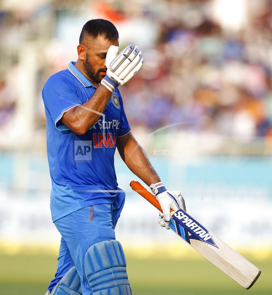 Aijaz Rahi FILE - In this Saturday, Oct. 29, 2016, file photo, Indian cricket captain Mahendra Singh Dhoni leaves the ground after being dismissed during the fifth and last one day international cricket match against New Zealand in Visakhapatnam, India. India great Dhoni announced his retirement from international cricket on Saturday, Aug. 15, 2020. Under Dhoni’s stewardship, India won the T20 World Cup in 2007, the 50-over World Cup in 2011 and the Champions Trophy in 2013. (AP Photo/Aijaz Rahi, File)
