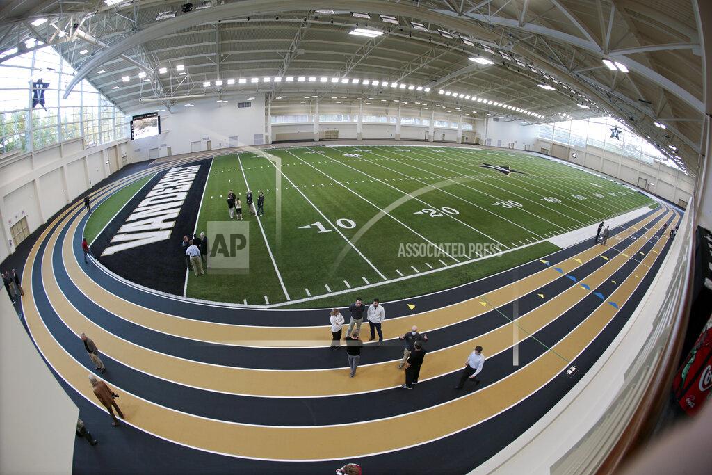 FILE — In this Nov. 5, 2013, file photo made with a fisheye lens, people view Vanderbilt's new multipurpose facility field house in Nashville, Tenn. Vanderbilt announced a $300 million project Monday, March 29, 2021, to improve football and basketball facilities and a new Vandy United Fund to raise money for athletics programs. (AP Photo/Mark Humphrey, File)