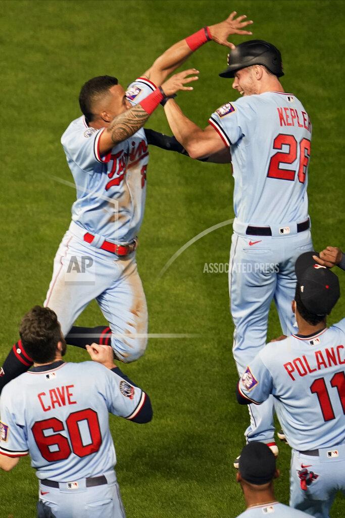 Jim Mone Minnesota Twins' Eddie Rosario, top left, and Max Kepler, top right, celebrate Kepler's single off Detroit Tigers pitcher Bryan Garcia that drove in Rosario for the winning run in the 10th inning of a baseball game Tuesday, Sept. 22, 2020, in Minneapolis. The Twins won 5-4. (AP Photo/Jim Mone)