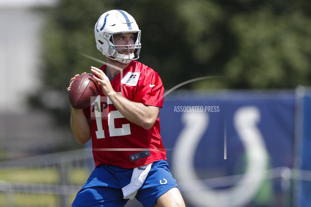 Michael Conroy Indianapolis Colts quarterback Andrew Luck (12) throws during practice at the NFL team's football training camp in Westfield, Ind., Thursday, July 25, 2019. (AP Photo/Michael Conroy)fbn