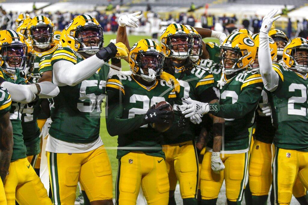 Matt Ludtke Green Bay Packers' Darnell Savage (26) celebrates his interception with teammates during the first half of an NFL football game Sunday, Nov. 29, 2020, in Green Bay, Wis. (AP Photo/Matt Ludtke)
