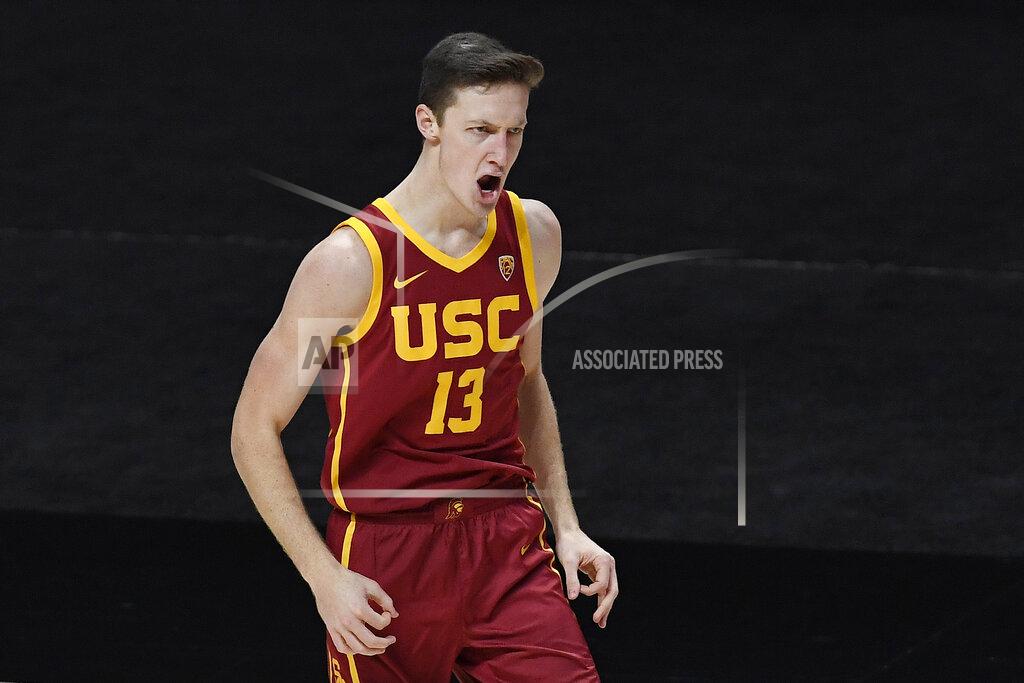 Jessica Hill Southern California's Drew Peterson reacts after scoring a basket in the second half of an NCAA college basketball game against BYU, Tuesday, Dec. 1, 2020, in Uncasville, Conn. (AP Photo/Jessica Hill)