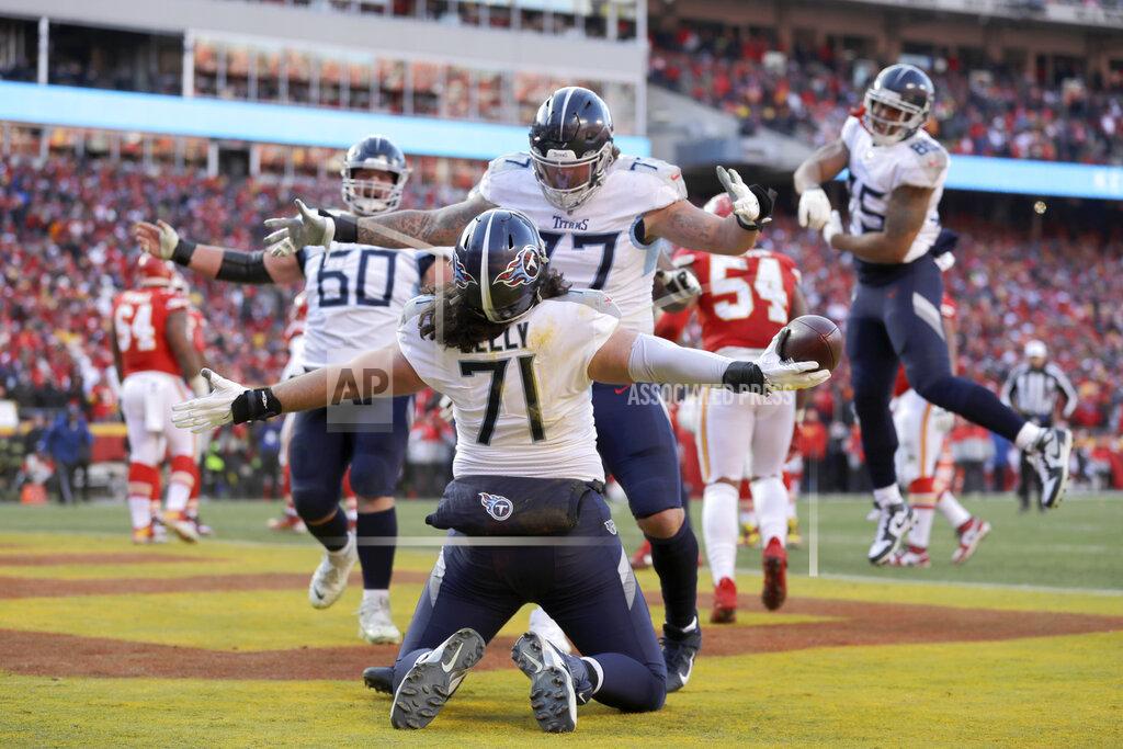 Jeff Roberson Tennessee Titans' Dennis Kelly (71) celebrates after catching a touchdown pass during the first half of the NFL AFC Championship football game against the Kansas City Chiefs Sunday, Jan. 19, 2020, in Kansas City, MO. (AP Photo/Jeff Roberson)