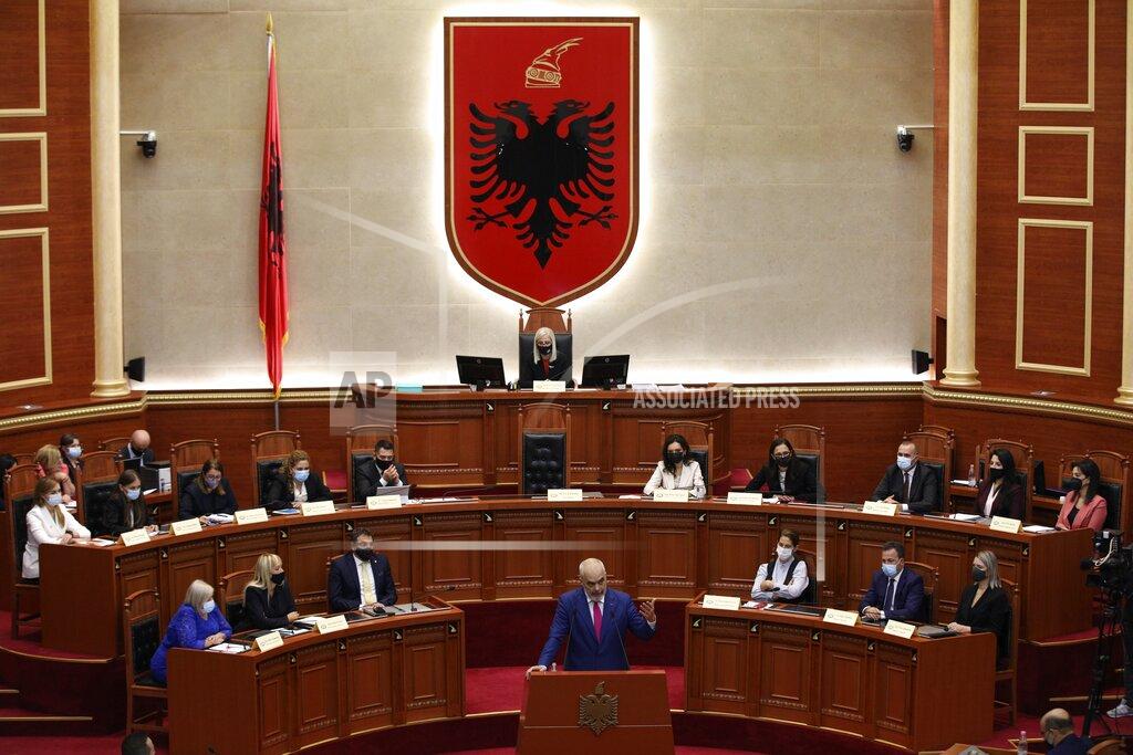 Franc Zhurda Albanian Prime Minister Edi Rama speaks during a debate at the parliament in Tirana, Albania, Thursday, Sept. 16, 2021. Albania's parliament was to vote late Thursday to approve the new, female-dominated Cabinet of Prime Minister Edi Rama, with 12 of the 17 jobs going to women, propelling Albania to the top of global rankings in terms of the percentage of women holding Cabinet positions. (AP Photo/Franc Zhurda)