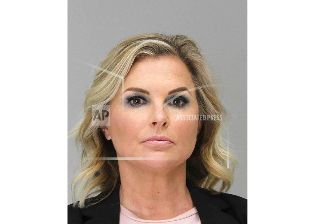 This Tuesday, May 5, 2020 booking photo provided by the Dallas County Sheriff's Office shows Shelly Luther. Luther was ordered to spend a week in jail after she continued to operate her business despite being issued a citation last month for keeping open her Dallas salon due to restrictions put in place because of the coronavirus pandemic. Luther's hearing occurred as Texas Gov. Greg Abbott relaxed more restrictions statewide, allowing barbershops and hair salons to reopen Friday. (Dallas County Sheriff's Office via AP)