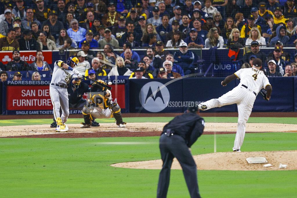 Mike Mcginnis Milwaukee Brewers' Christian Yelich hits a single against the San Diego Padres during the sixth inning of a baseball game Tuesday, May 24, 2022, in San Diego. (AP Photo/Mike McGinnis)