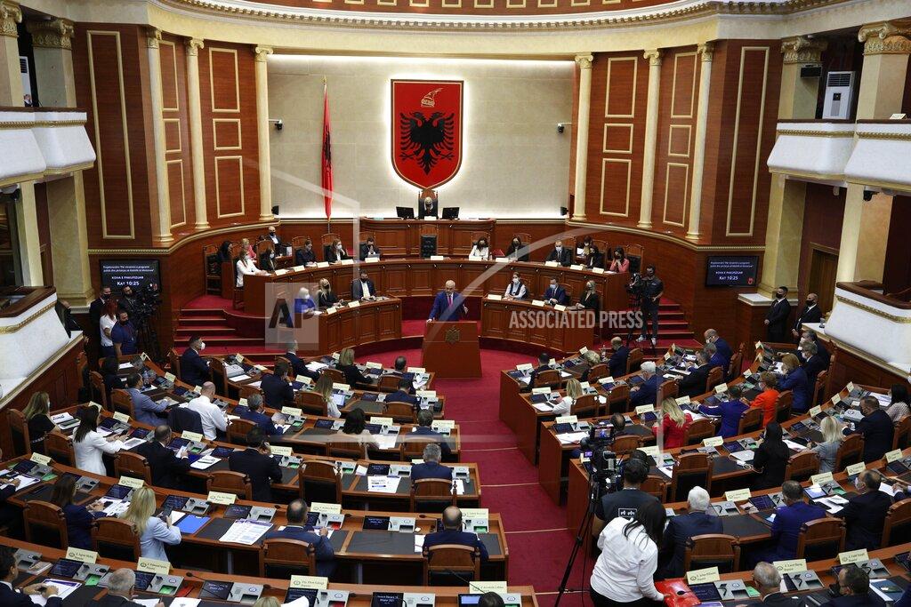 Franc Zhurda Albanian Prime Minister Edi Rama speaks during a debate at the parliament in Tirana, Albania, Thursday, Sept. 16, 2021. Albania's parliament was to vote late Thursday to approve the new, female-dominated Cabinet of Prime Minister Edi Rama, with 12 of the 17 jobs going to women, propelling Albania to the top of global rankings in terms of the percentage of women holding Cabinet positions. (AP Photo/Franc Zhurda)