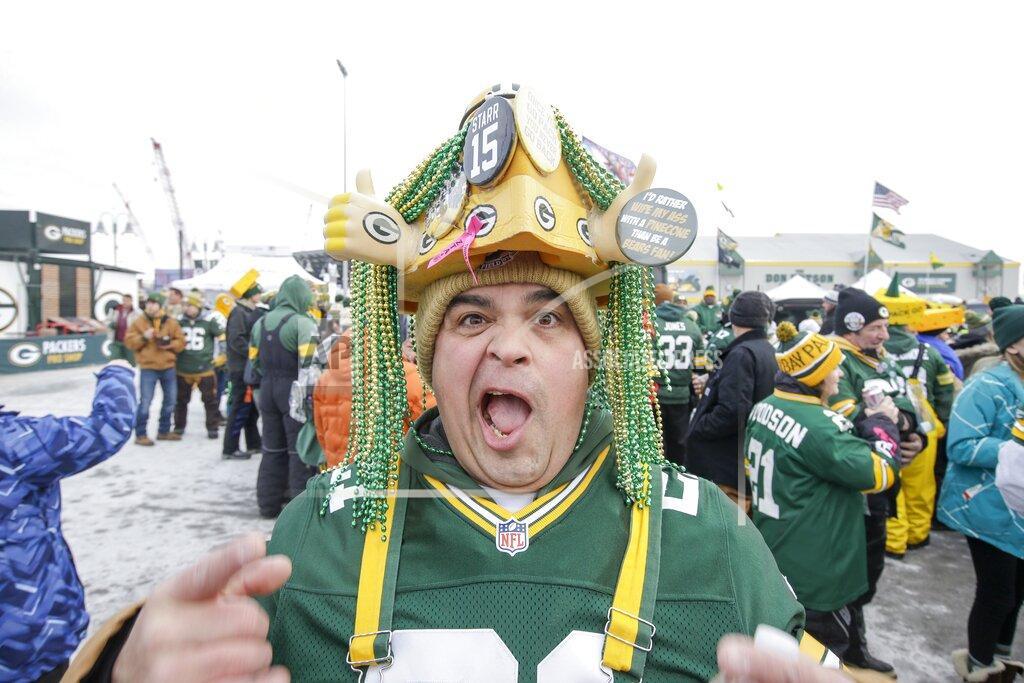 Mike Roemer Oscar Lima tailgates before an NFL divisional playoff football game between the Green Bay Packers and the Seattle Seahawks Sunday, Jan. 12, 2020, in Green Bay, Wis. (AP Photo/Mike Roemer)