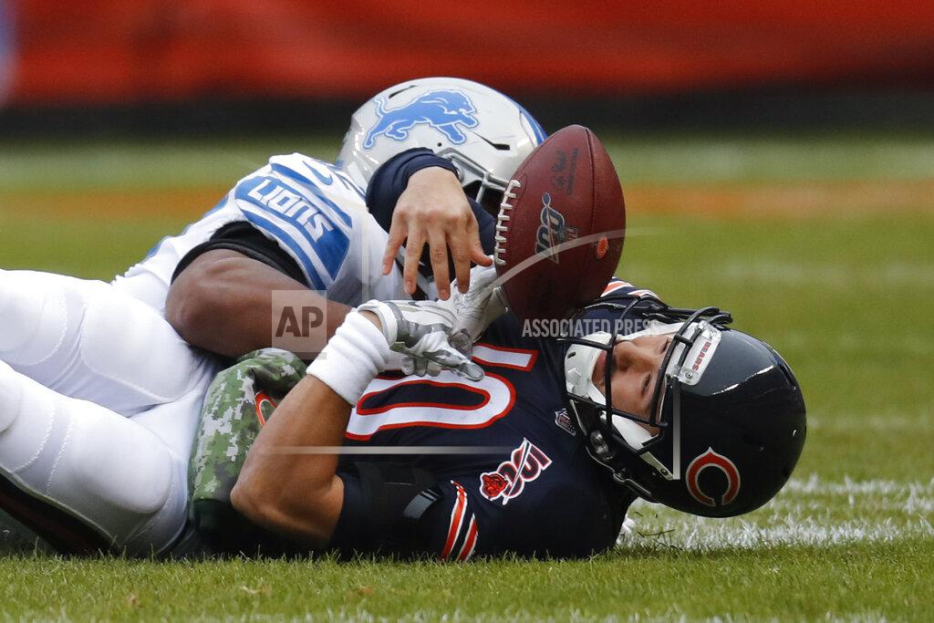 Charles Rex Arbogast Chicago Bears quarterback Mitchell Trubisky (10) loses the ball after being hit by Detroit Lions outside linebacker Devon Kennard (42) during the first half of an NFL football game in Chicago, Sunday, Nov. 10, 2019. Chicago recovered the ball. (AP Photo/Charles Rex Arbogast)