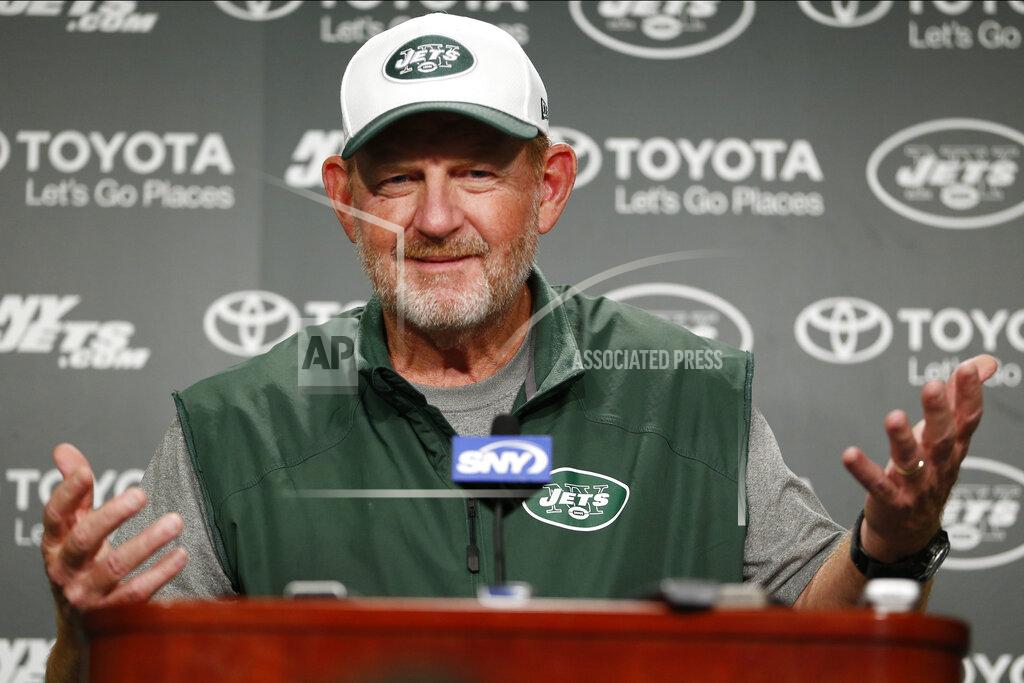Julio Cortez FILE - In this Nov. 5, 2015, file photo, then-New York Jets offensive coordinator Chan Gailey speaks to reporters during NFL football practice in Florham Park, N.J. Enjoying a life filled with golf and grandkids, Gailey was three years into a pretty typical retirement when it took a twist. Miami Dolphins coach Brian Flores called and offered Gailey a job as offensive coordinator. “I was taken aback a little bit,” Gailey said Saturday, Aug. 8, 2020, looking back on that transformative phone conversation seven months ago. (AP Photo/Julio Cortez, File)
