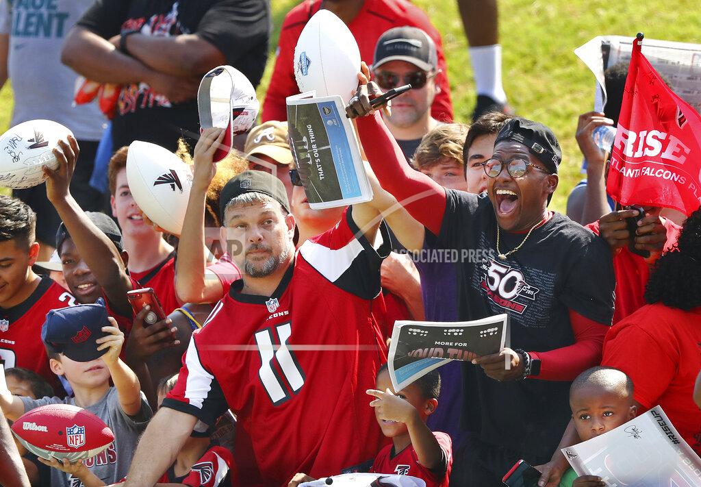 Compton@Ajc.com Atlanta Falcons fans seek autographs during an NFL football team practice in Flowery Branch, Ga., Monday, July 29, 2019. (Curtis Compton/Atlanta Journal-Constitution via AP)