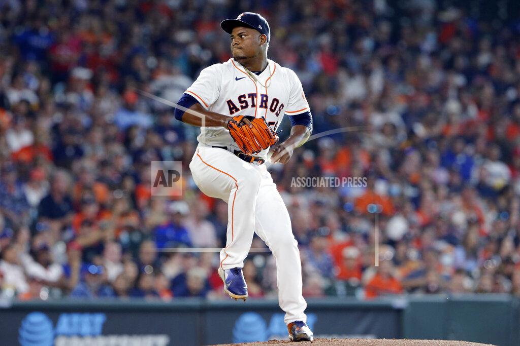 Michael Wyke Houston Astros starting pitcher Framber Valdez winds up during the first inning of the team's baseball game against the Texas Rangers on Saturday, July 24, 2021, in Houston. (AP Photo/Michael Wyke)