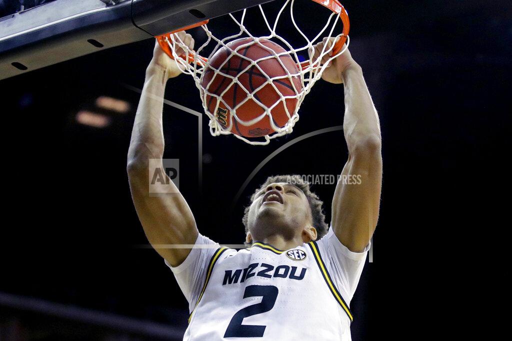 Charlie Riedel Missouri forward Tray Jackson dunks during the first half of an NCAA college basketball game against Butler, Monday, Nov. 25, 2019, in Kansas City, Mo. (AP Photo/Charlie Riedel)