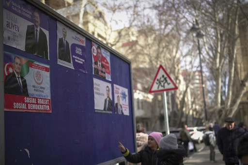 Election posters of all Azerbaijani presidential candidates are displayed in Baku, Azerbaijan, Monday, Feb. 5, 2024. Azerbaijan will hold presidential elections on Wednesday, Feb. 7, 2024. (AP Photo/Sergei Grits)