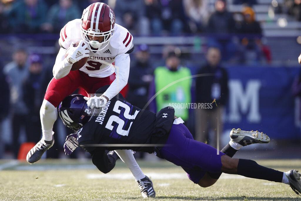 Jim Young Massachusetts' Isaiah Rodgers, left, is tackled by Northwestern's Bryce Jackson during the second half of an NCAA college football game Saturday, Nov. 16, 2019, in Evanston, Ill. (AP Photo/Jim Young)