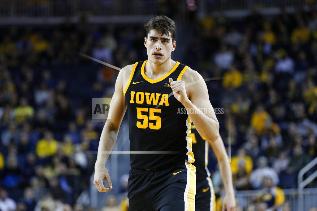 Paul Sancya Iowa center Luka Garza reacts to a basket against Michigan in the second half of an NCAA college basketball game in Ann Arbor, Mich., Friday, Dec. 6, 2019. (AP Photo/Paul Sancya)