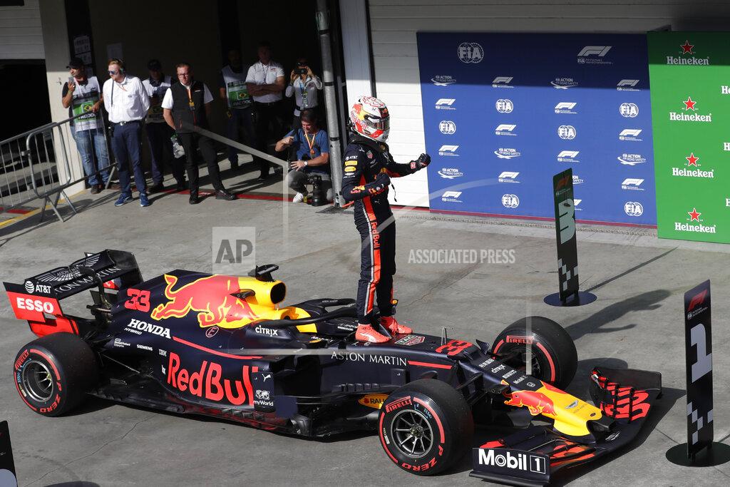 Silvia Izquierdo Red Bull driver Max Verstappen, of the Netherlands, celebrates after taking pole position during the qualifying session for the Formula One Brazil Grand Prix at the Interlagos race track in Sao Paulo, Brazil, Saturday, Nov. 16, 2019. (AP Photo/Silvia Izquierdo)