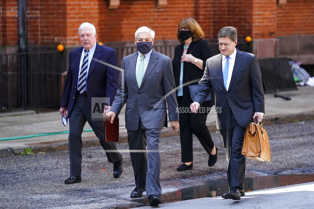 Matt Rourke Former Penn State President Graham Spanier walks from the Dauphin County Courthouse in Harrisburg, Pa., after a hearing at Wednesday, May 26, 2021. A judge has upheld the jail sentence of Spanier who was forced out as the school's top administrator after Jerry Sandusky was arrested nearly a decade ago. The judge said Spanier must report to jail on July 9 to begin serving at least two months for endangering the welfare of children, followed by two months of house arrest. (AP Photo/Matt Rourke)