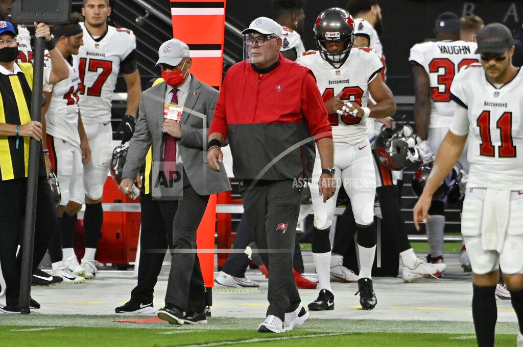 David Becker Tampa Bay Buccaneers head coach Bruce Arians walks onto the field after defeating the Las Vegas Raiders in an NFL football game, Sunday, Oct. 25, 2020, in Las Vegas. (AP Photo/David Becker)