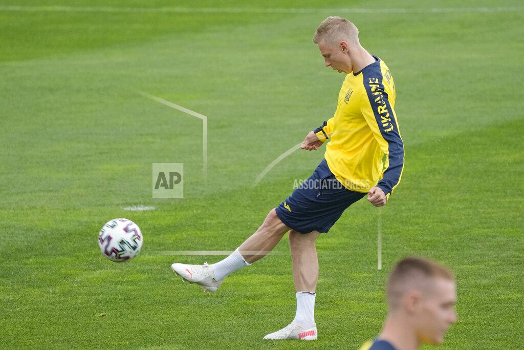 Vadim Ghirda Ukraine's Oleksandr Zinchenko kicks a ball during a training session in Voluntari, on the outskirts of Bucharest, Romania, Thursday, June 10, 2021 a day before the start of Euro 2020 soccer championship. Ukraine must modify its team shirt for the European Championship after UEFA on Thursday upheld part of a Russian complaint about slogans and a map that included Crimea. (AP Photo/Vadim Ghirda)
