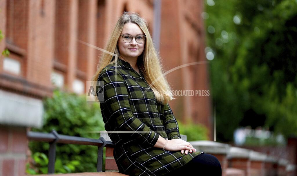 Michael Sohn Election campaign manager Leonie Pouw smiles prior to an interview with the Associated Press in Berlin, Germany, Saturday, Sept. 18, 2021. Pouw, a 24-year-old election campaign manager in Berlin, was eight years old when Merkel came to power, so she says it was the most normal thing for her to have a female chancellor. (AP Photo/Michael Sohn)