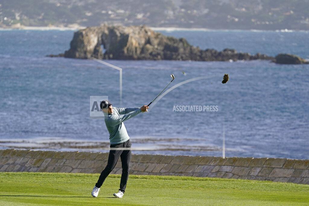 Eric Risberg Jordan Spieth hits his approach shot to the 18th green of the Pebble Beach Golf Links during the third round of the AT&T Pebble Beach Pro-Am golf tournament Saturday, Feb. 13, 2021, in Pebble Beach, Calif. (AP Photo/Eric Risberg)