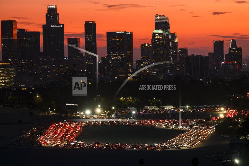 Ringo H.w. Chiu Motorists wait in lines to take a coronavirus test in a parking lot at Dodger Stadium, Monday, Jan. 4, 2021, in Los Angeles. (AP Photo/Ringo H.W. Chiu)