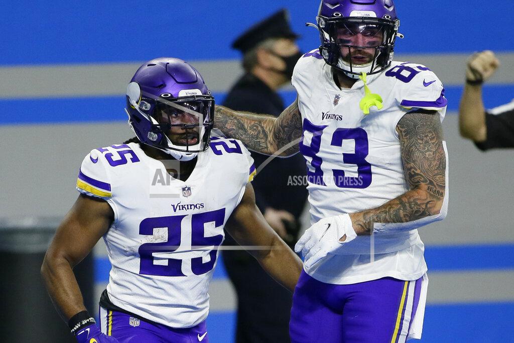 Duane Burleson Minnesota Vikings running back Alexander Mattison (25) is congratulated by tight end Tyler Conklin (83) after his touchdown during the first half of an NFL football game against the Detroit Lions, Sunday, Jan. 3, 2021, in Detroit. (AP Photo/Duane Burleson)