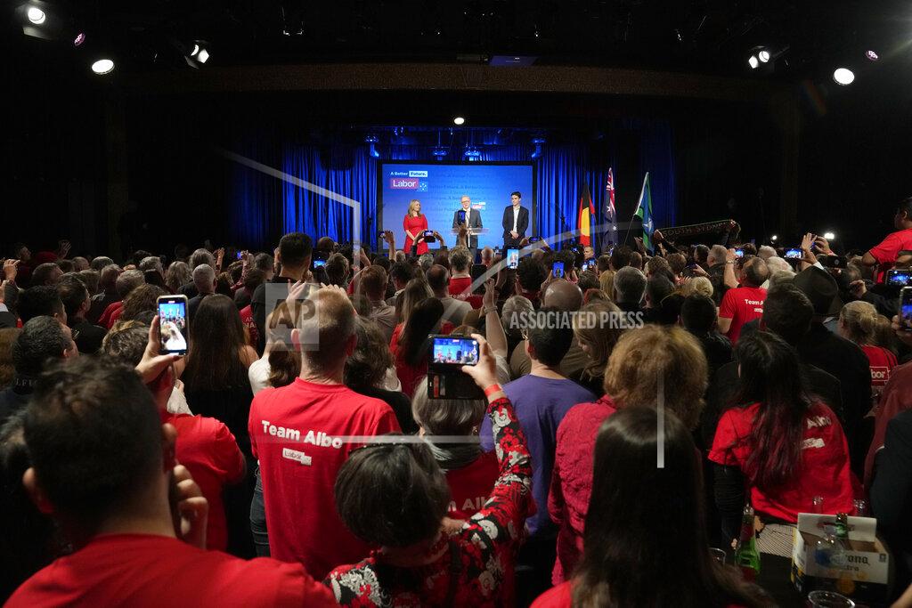 Rick Rycroft Labor Party leader Anthony Albanese, center back, speaks to supporters at a Labor Party event in Sydney, Australia, Sunday, May 22, 2022, after Prime Minister Scott Morrison conceding defeat to Albanese in a federal election. (AP Photo/Rick Rycroft)