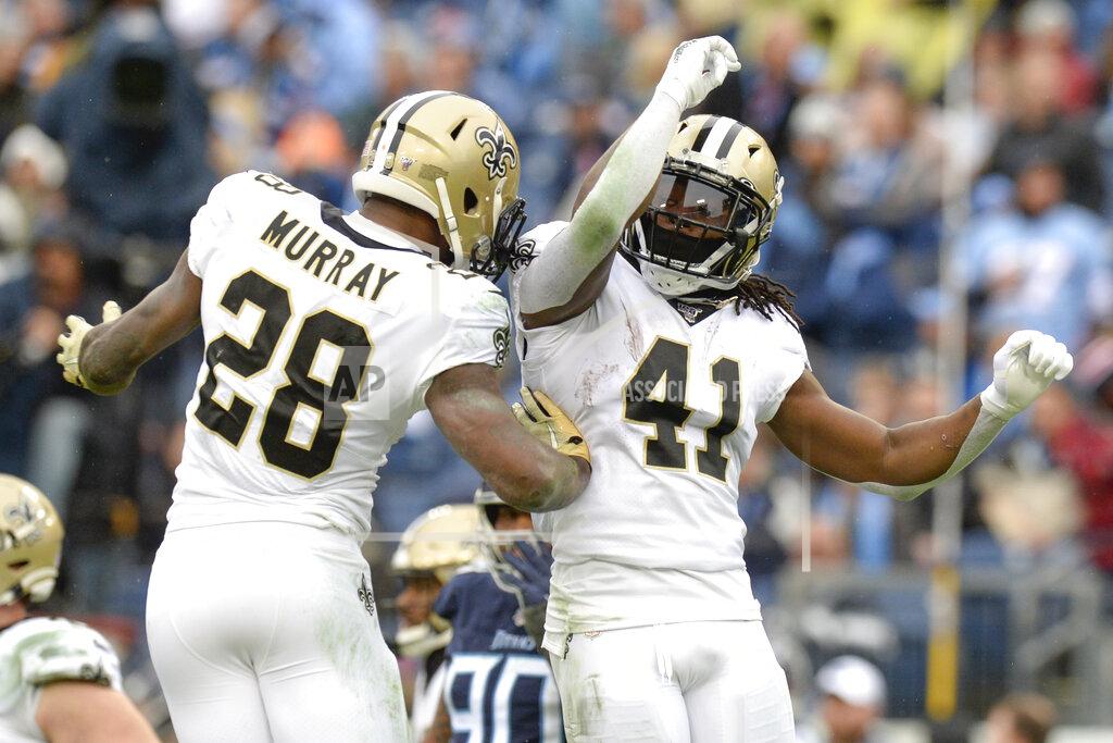 Mark Zaleski New Orleans Saints running back Alvin Kamara (41) celebrates with running back Latavius Murray (28) after Kamara scored a touchdown against the Tennessee Titans in the second half of an NFL football game Sunday, Dec. 22, 2019, in Nashville, Tenn. (AP Photo/Mark Zaleski)