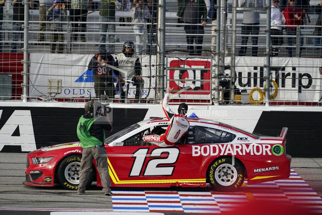 Brynn Anderson Ryan Blaney celebrates his win after a NASCAR Cup Series auto race at Atlanta Motor Speedway on Sunday, March 21, 2021, in Hampton, Ga. (AP Photo/Brynn Anderson)