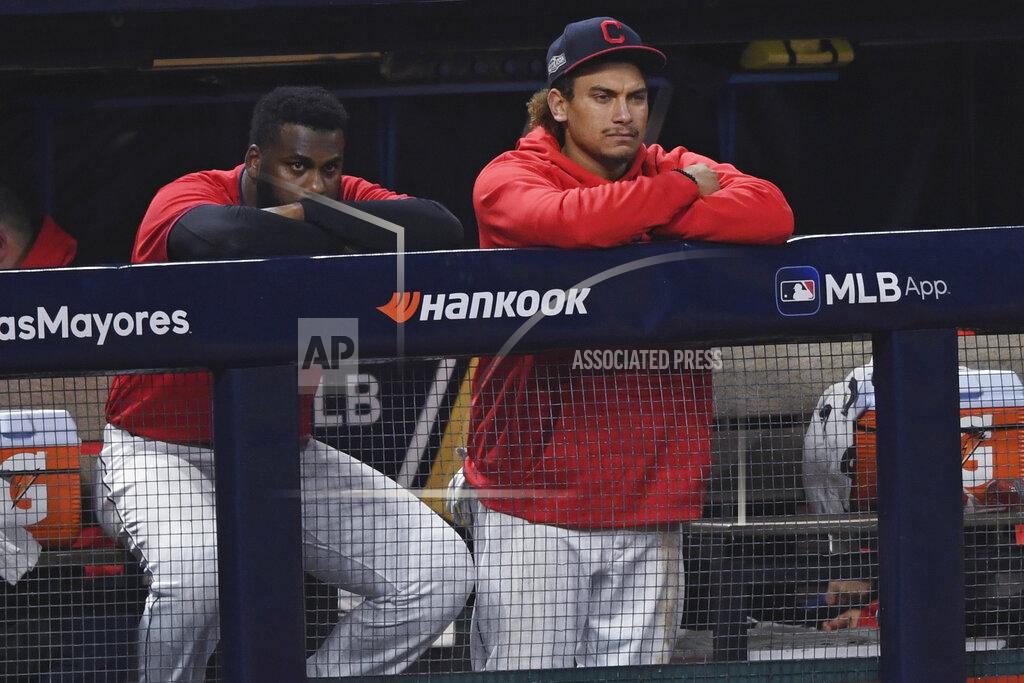 David Dermer Cleveland Indians' Josh Naylor, right, and Franmil Reyes watch from the dugout after the Indians lost 10-9 to the New York Yankees in Game 2 of an American League wild-card baseball series, early Thursday, Oct. 1, 2020, in Cleveland. (AP Photo/David Dermer)