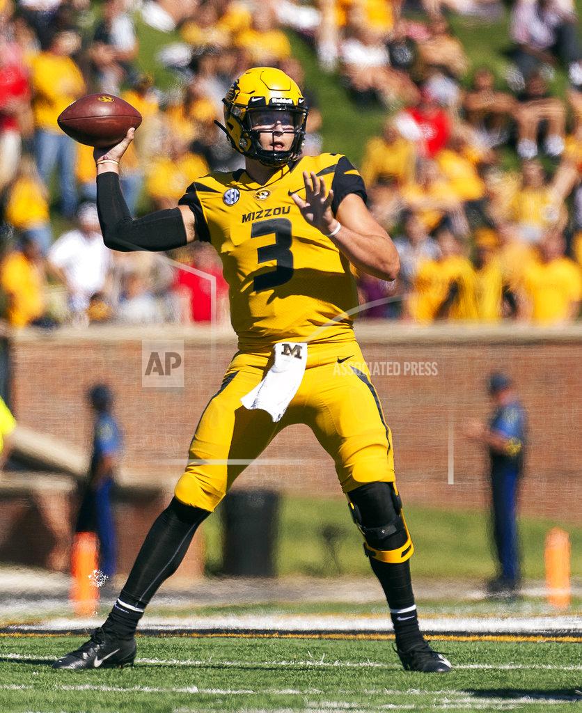 FILE - In this Saturday, Sept. 22, 2018, file photo, Missouri quarterback Drew Lock throws a pass during the first half of an NCAA college football game against Georgia in Columbia, Mo. The bye week came at a good time for Lock and Missouri, which hung with Georgia before mistakes wound up biting them. Missouri committed three turnovers and had a punt blocked that resulted in a touchdown. (AP Photo/L.G. Patterson)