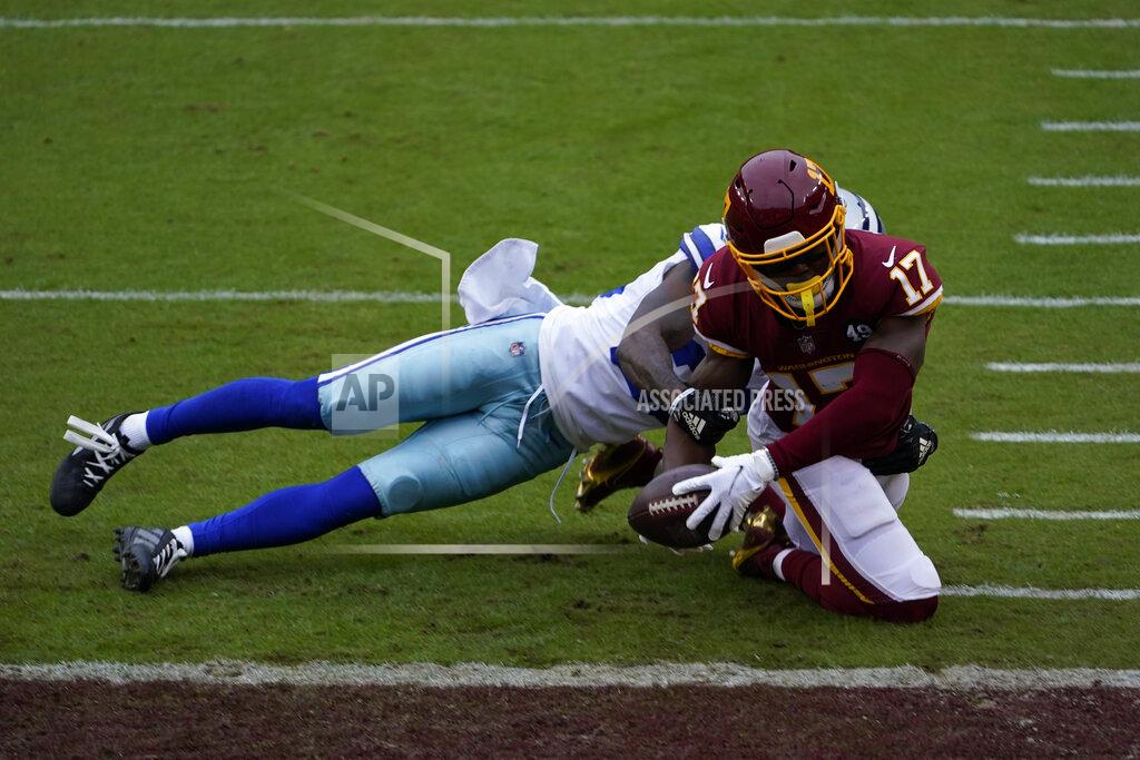 Susan Walsh Washington Football Team wide receiver Terry McLaurin (17) is taken down by Dallas Cowboys cornerback Jourdan Lewis (26) in the first half of an NFL football game, Sunday, Oct. 25, 2020, in Landover, Md. (AP Photo/Susan Walsh)