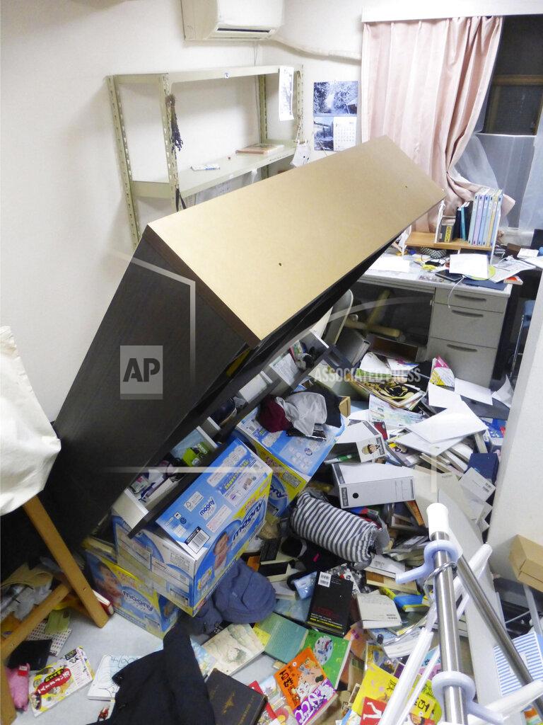 Uncredited Furniture falls following an earthquake in Koriyama, Fukushima prefecture, northeastern Japan Saturday, Feb. 13, 2021. A strong earthquake hit off the coast of northeastern Japan late Saturday, shaking Fukushima, Miyagi and other areas, but there was no threat of a tsunami, officials said. (Kyodo News via AP)
