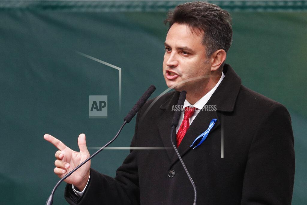 Laszlo Balogh Hungarian opposition candidate Peter Marki-Zay addresses supporters during celebration the 65th anniversary of the 1956 Hungarian revolution, in Budapest, Hungary, Saturday, Oct. 23, 2021. Earlier thousands of supporters of Prime Minister Viktor Orban, who delivered a speech marking the 65th anniversary of the 1956 Hungarian revolution, marched to demonstrate loyalty to his right-wing government. (AP Photo/Laszlo Balogh)