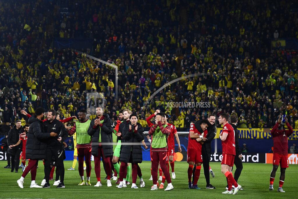 Jose Breton Liverpool's players celebrate after the Champions League semi final, second leg soccer match between Villarreal and Liverpool at the Ceramica stadium in Villarreal, Spain, Tuesday, May 3, 2022. (AP Photo/Jose Breton)