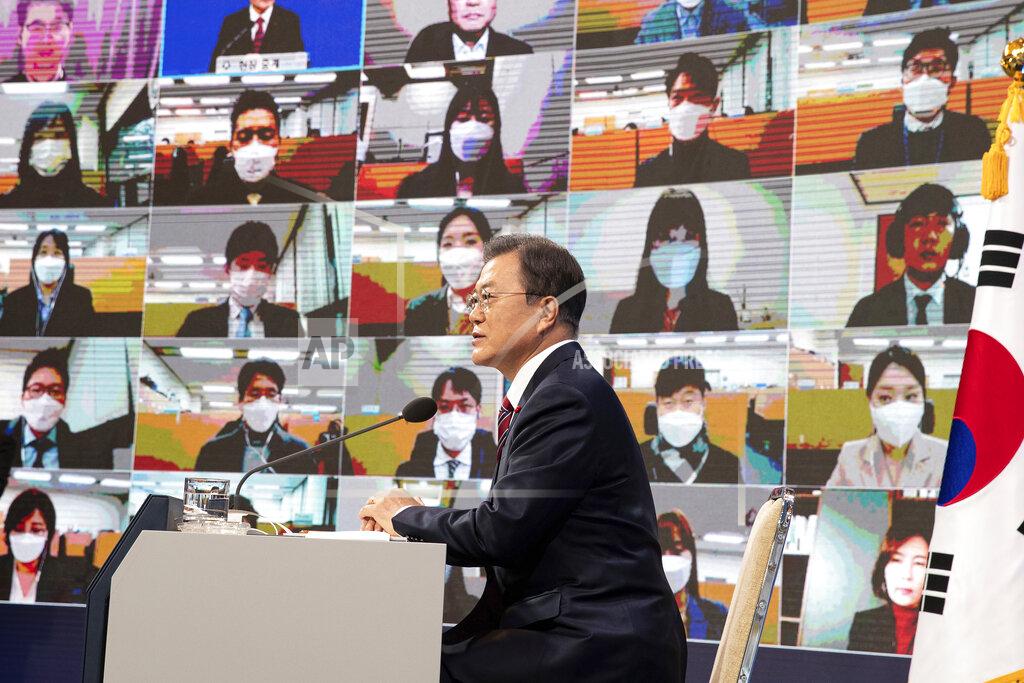 Jeon Heon-Kyun South Korean President Moon Jae-in speaks during an on-line New Year press conference with local and foreign journalists at the Presidential Blue House in Seoul, South Korea Monday, Jan. 18, 2021. (Jeon Heon-kyun/Pool Photo via AP)