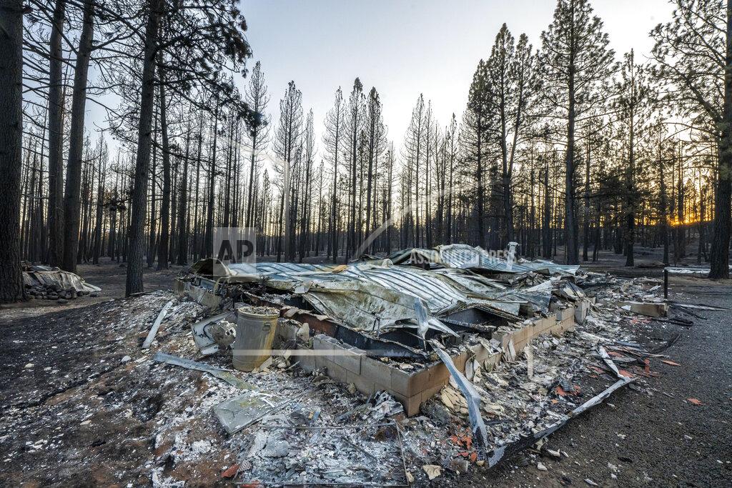 Nathan Howard A home destroyed by the Bootleg Fire is seen here on Wednesday, July 21, 2021 near Bly, Ore. (AP Photo/Nathan Howard)