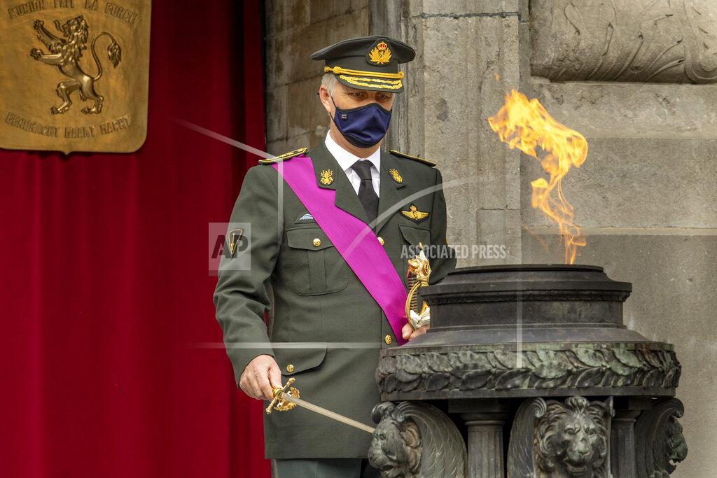 Olivier Matthys Belgium's King Philippe attends an Armistice Day ceremony at the Congress Column in Brussels, Wednesday, Nov. 11, 2020. (Olivier Matthys, Pool via AP)