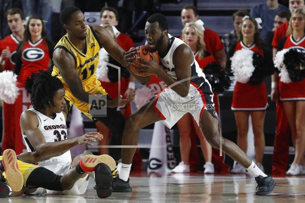Jenn Finch Georgia guard William Jackson II (0) fights Kennesaw State guard Kyle Clarke (11) for possession of the ball during an NCAA college basketball game in Athens, Ga., Tuesday, Nov. 27, 2018. (Jenn Finch/Athens Banner-Herald via AP)