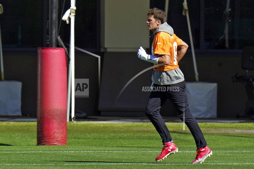 Chris O'meara Tampa Bay Buccaneers quarterback Tom Brady (12) runs during an NFL football workout Thursday, Jan. 28, 2021, in Tampa, Fla. The Buccaneers play the Kansas City Chiefs in Super Bowl LV on Feb. 7. (AP Photo/Chris O'Meara)