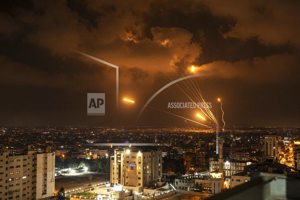 Fatima Shbair Rockets fired by Palestinian militants toward Israel, in Gaza City, Friday, Aug. 5, 2022. Palestinian officials say Israeli airstrikes on Gaza have killed at least 10 people, including a senior militant, and wounded 55 others. (AP Photo/Fatima Shbair)
