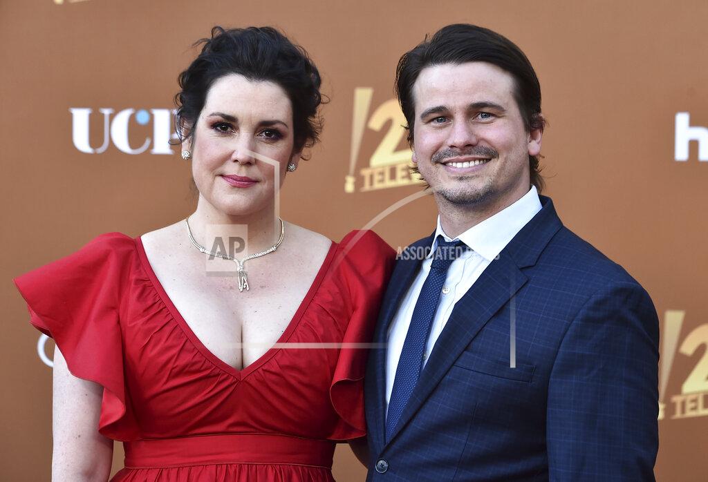 Jordan Strauss Cast member Melanie Lynskey, left, arrives with her husband and fellow cast member, Jason Ritter, at the Los Angeles premiere of "Candy," on Monday, May 9, 2022, at El Capitan Theatre. (Photo by Jordan Strauss/Invision/AP)