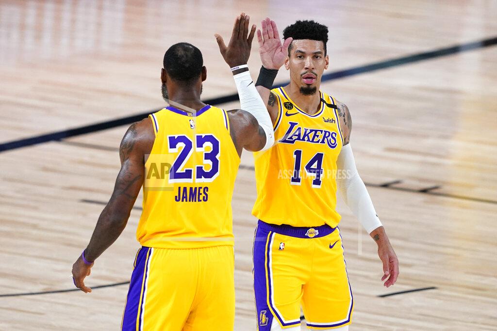Ashley Landis Los Angeles Lakers' LeBron James (23) and Danny Green (14) celebrate after a play against the Portland Trail Blazers during the first half of an NBA basketball first round playoff game Saturday, Aug. 29, 2020, in Lake Buena Vista, Fla. (AP Photo/Ashley Landis)