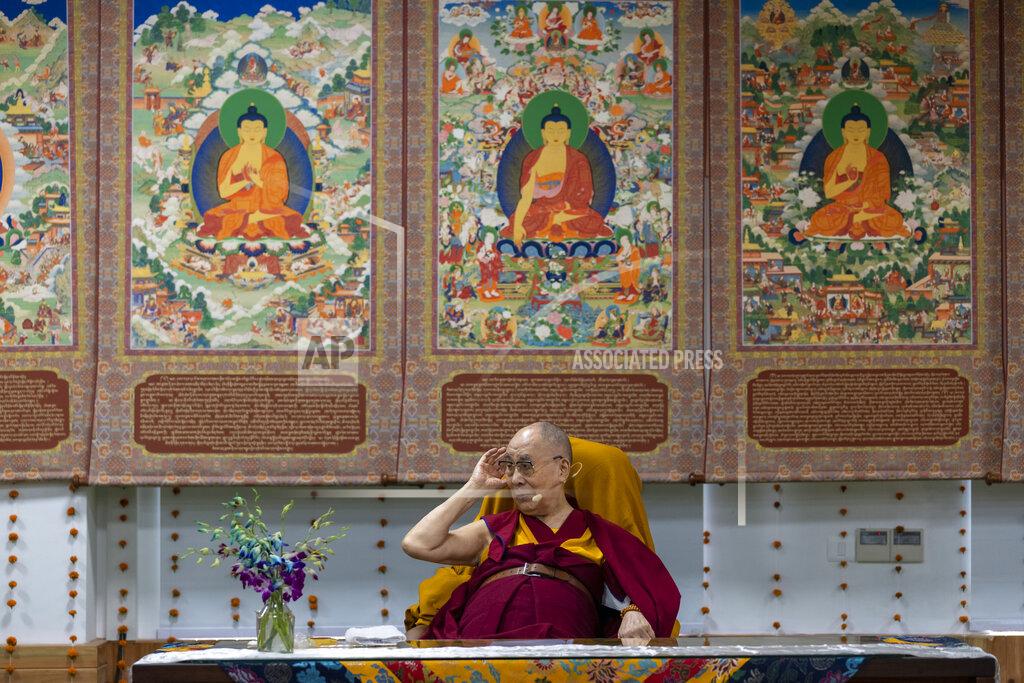Ashwini Bhatia Tibetan spiritual leader the Dalai Lama gestures after inaugurating a museum containing the archives of the institution of the Dalai Lama in Dharmsala, India, Wednesday, July 6, 2022. Exile Tibetans also celebrated their spiritual leader's 87th birthday today. (AP Photo/Ashwini Bhatia)