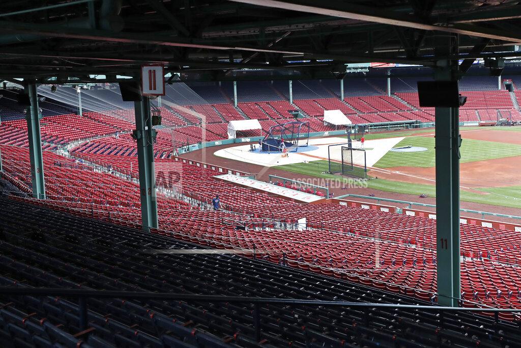 Elise Amendola Boston Red Sox players take batting practice during baseball training camp at Fenway Park, Monday, July 6, 2020, in Boston. (AP Photo/Elise Amendola)
