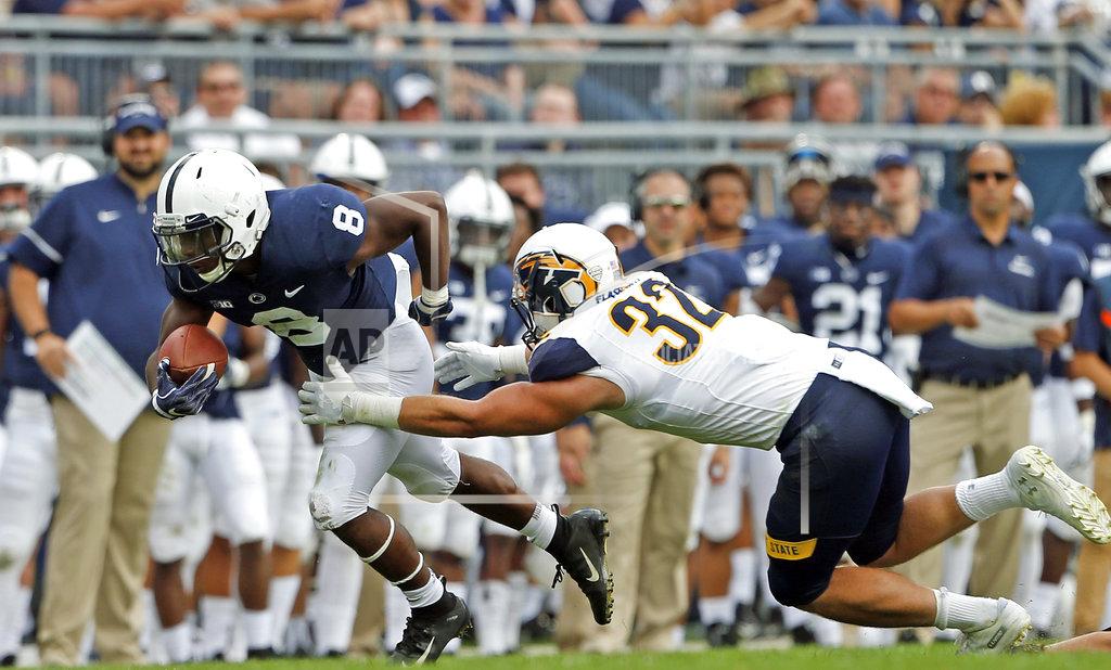 Chris Knight Penn State's Mark Allen (8) runs the ball as Kent State's Dalton Hicks (32) makes the tackle during the second half of an NCAA college football game in State College, Pa., Saturday, Sept. 15, 2018. Penn State won 63-10. (AP Photo/Chris Knight)