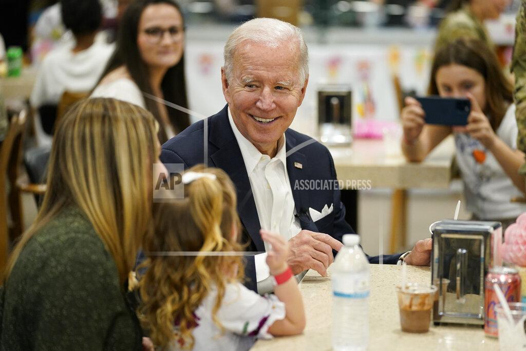 Evan Vucci U.S. President Joe Biden, center, meets with American service members and their family at Osan Air Base, Sunday, May 22, 2022, in Pyeongtaek, South Korea. (AP Photo/Evan Vucci)